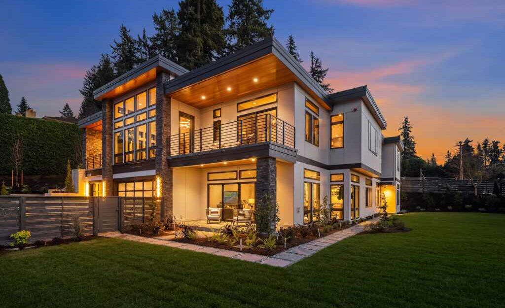 JBH home with lights on at night